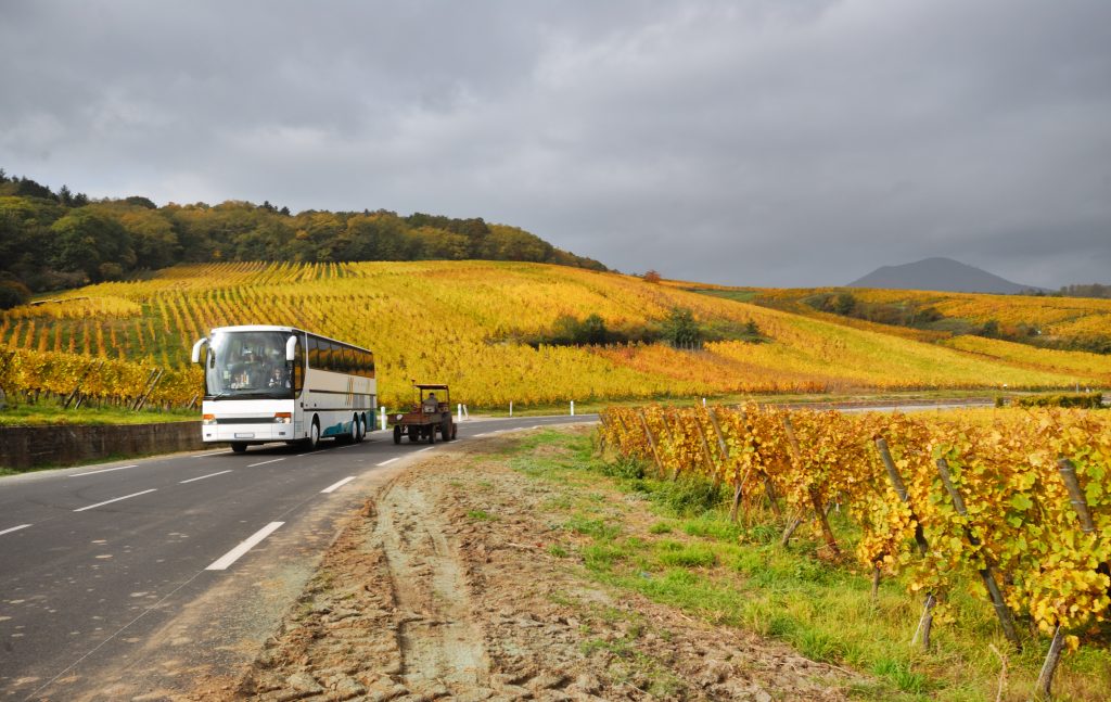 Scenic Vine Route Motorway in France, with a Bus and a tractor travelling on it.